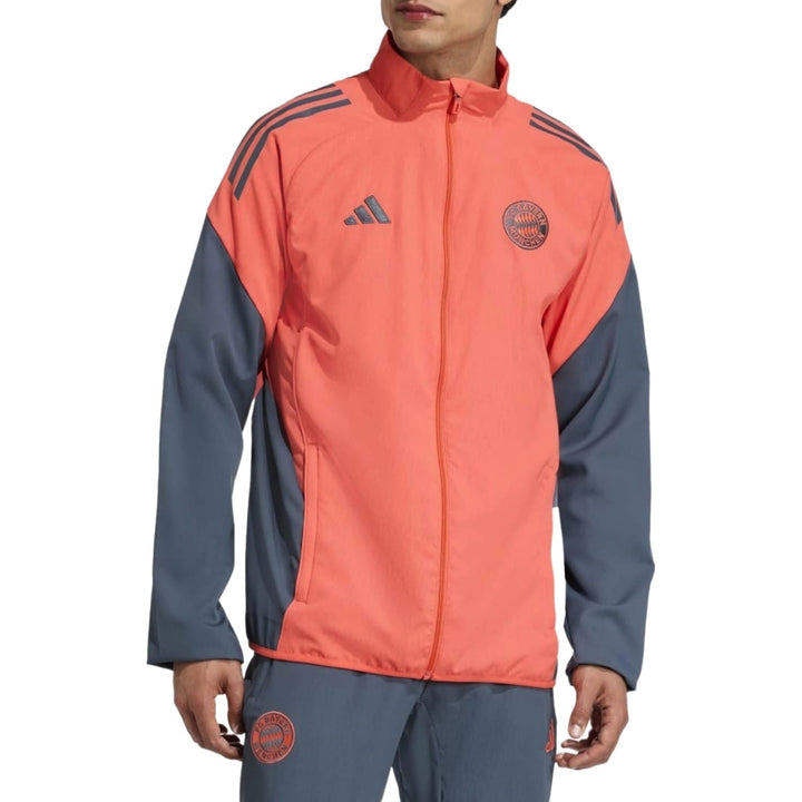 Bayern Munich presentation tracksuit 2025 featuring vibrant pink jacket and gray pants with Adidas logo