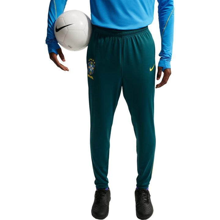 Green Nike x Brazil team soccer pants with elastic waistband and Brazil national team logo
