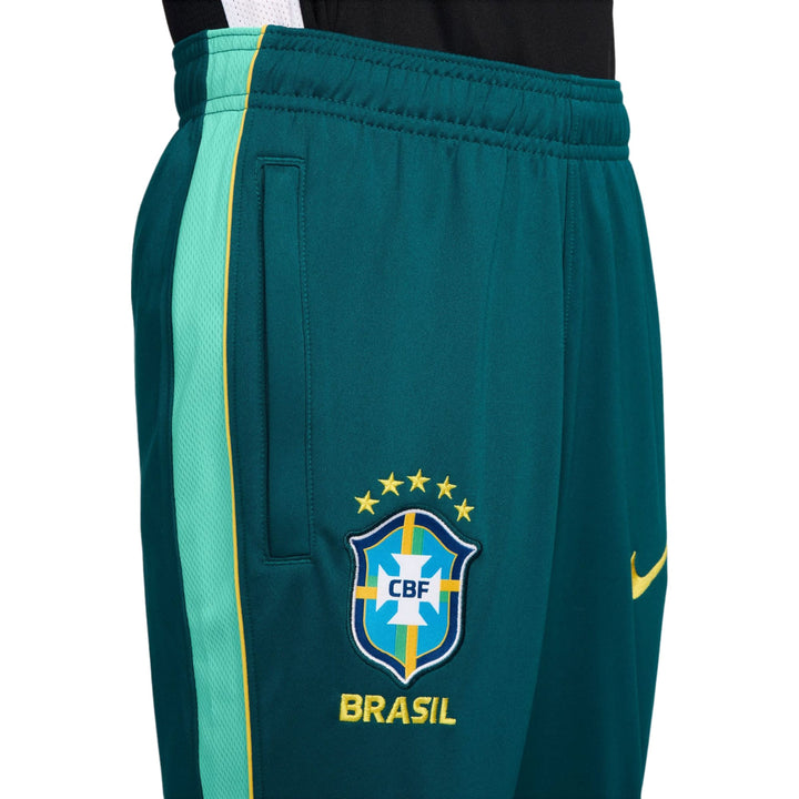 Teal Nike Brasil soccer shorts with side pockets and embroidered logo