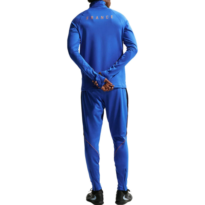 France training technical soccer tracksuit set in blue by Nike with long sleeves and fitted pants for adults