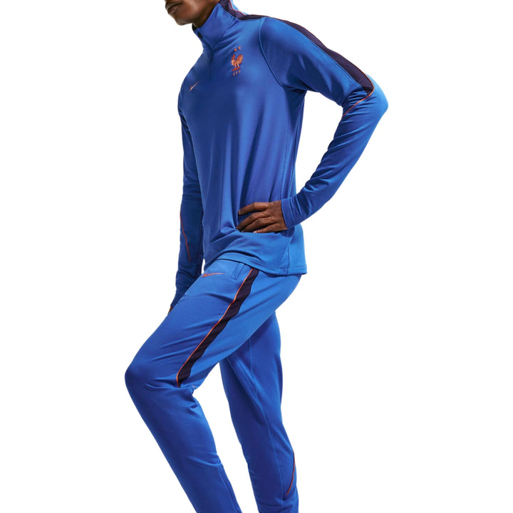2026 France training technical soccer tracksuit in blue, featuring the Nike logo and designed for adults in various sizes.