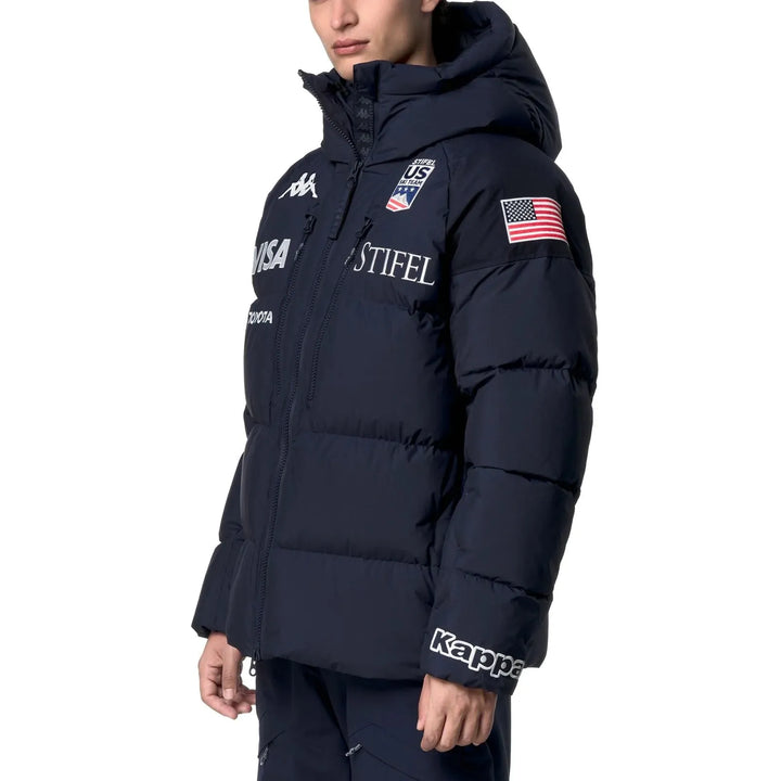 Navy Kappa x US Ski team blue puffer jacket with hood and USA flag, featuring Kappa brand and logo details.