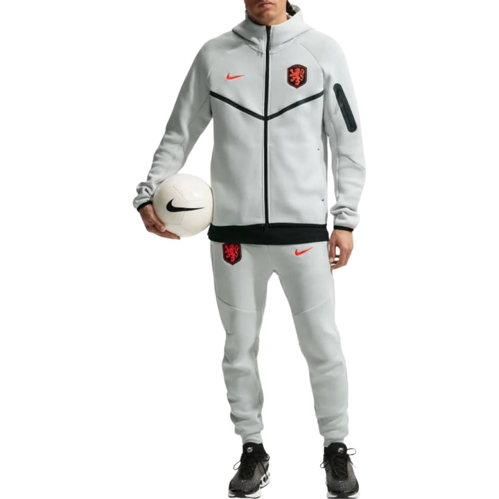 Netherlands Tech Fleece presentation soccer tracksuit 2026/27 by Nike in light grey with black details and logo