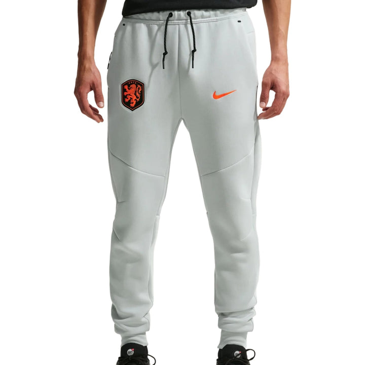 Nike Netherlands Tech Fleece presentation soccer tracksuit in gray with orange accents and team logo