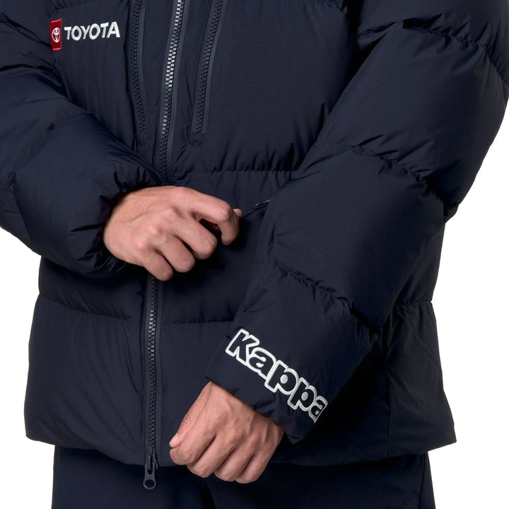 Navy Kappa x US Ski team puffer jacket made of nylon with Toyota and Kappa logos on the chest and sleeve.