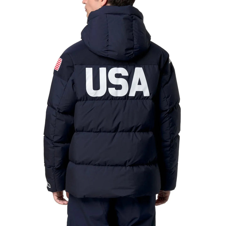 Navy Kappa x US Ski team  puffer jacket with USA logo, featuring a hood and American flag patch on the sleeve.