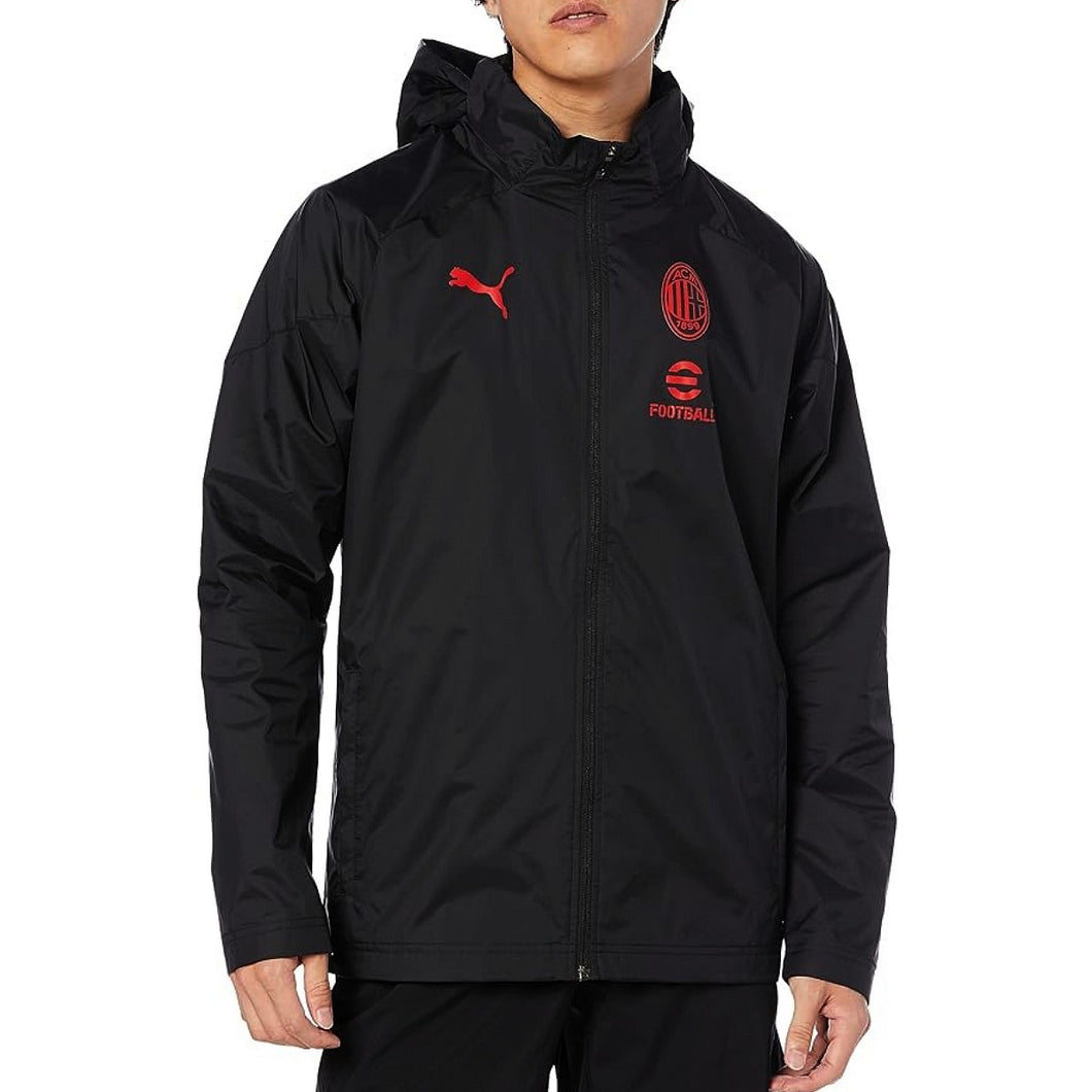 AC Milan black Puma rain jacket for fans featuring a hood and logo detailing