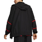 Back view of AC Milan pre game tracksuit 2024 featuring a stylish black design with red accents