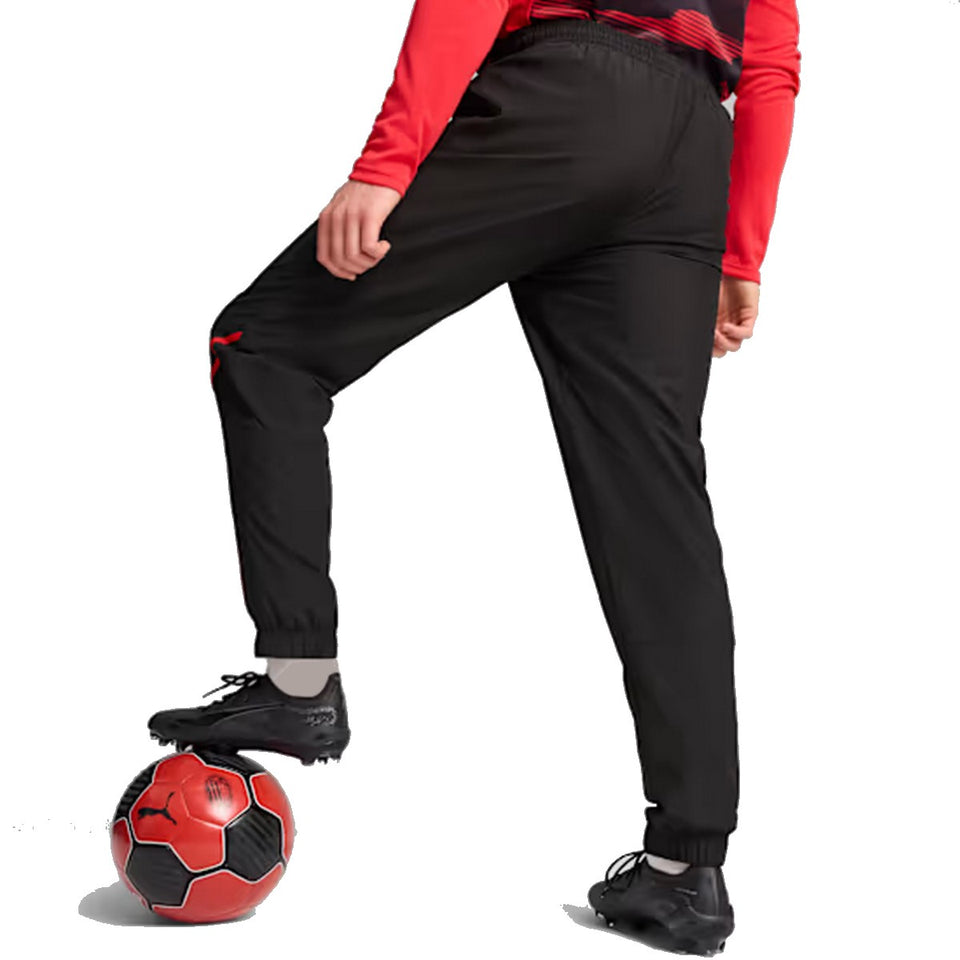 Back view of AC Milan pre game tracksuit 2024 in black and red, perfect for soccer training and warm-ups