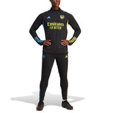 2023 24 Arsenal football tracksuit set in black with neon yellow and blue accents on SoccerTracksuits.com