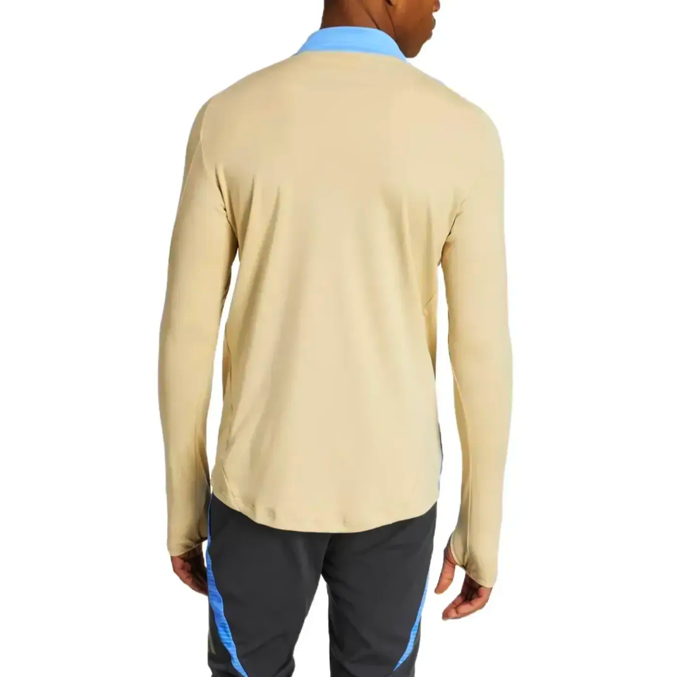 Back view of 2024 Argentina technical tracksuit Adidas beige top with blue collar and black pants with blue stripes
