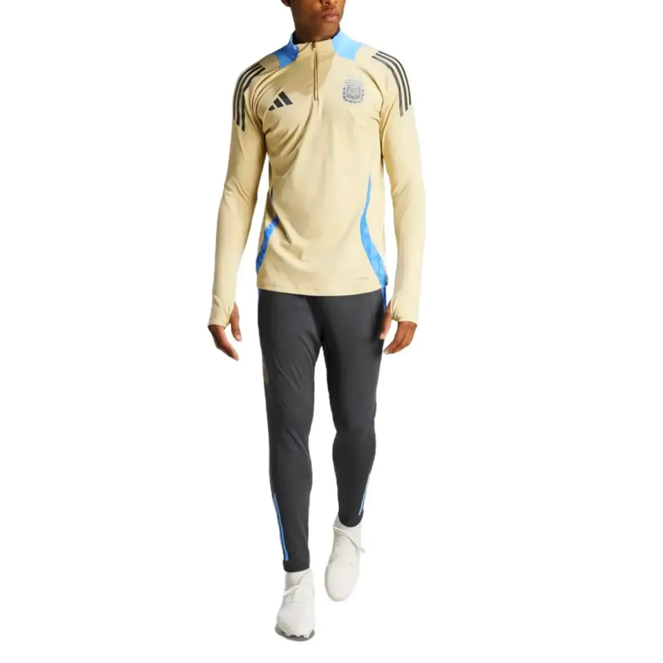2024 Argentina technical tracksuit Adidas with beige top and gray pants on SoccerTracksuits.com