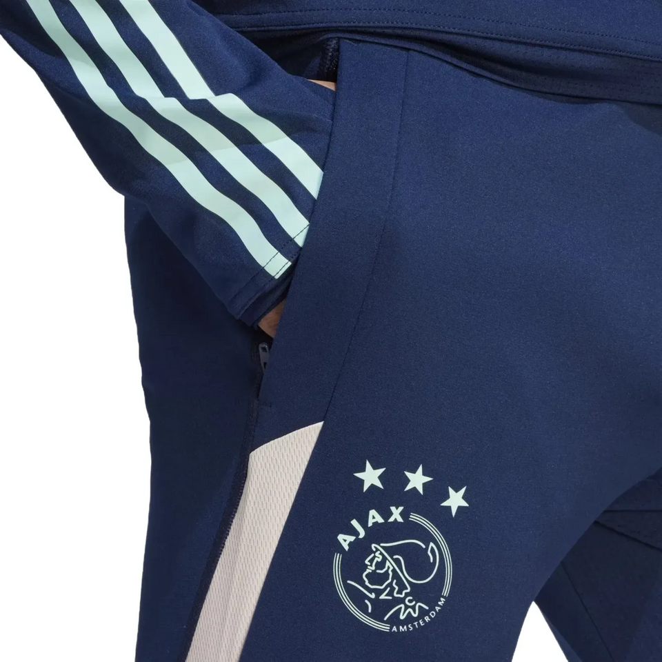 Ajax training tracksuit Adidas 2023 24 in navy blue with iconic logo and Adidas stripes