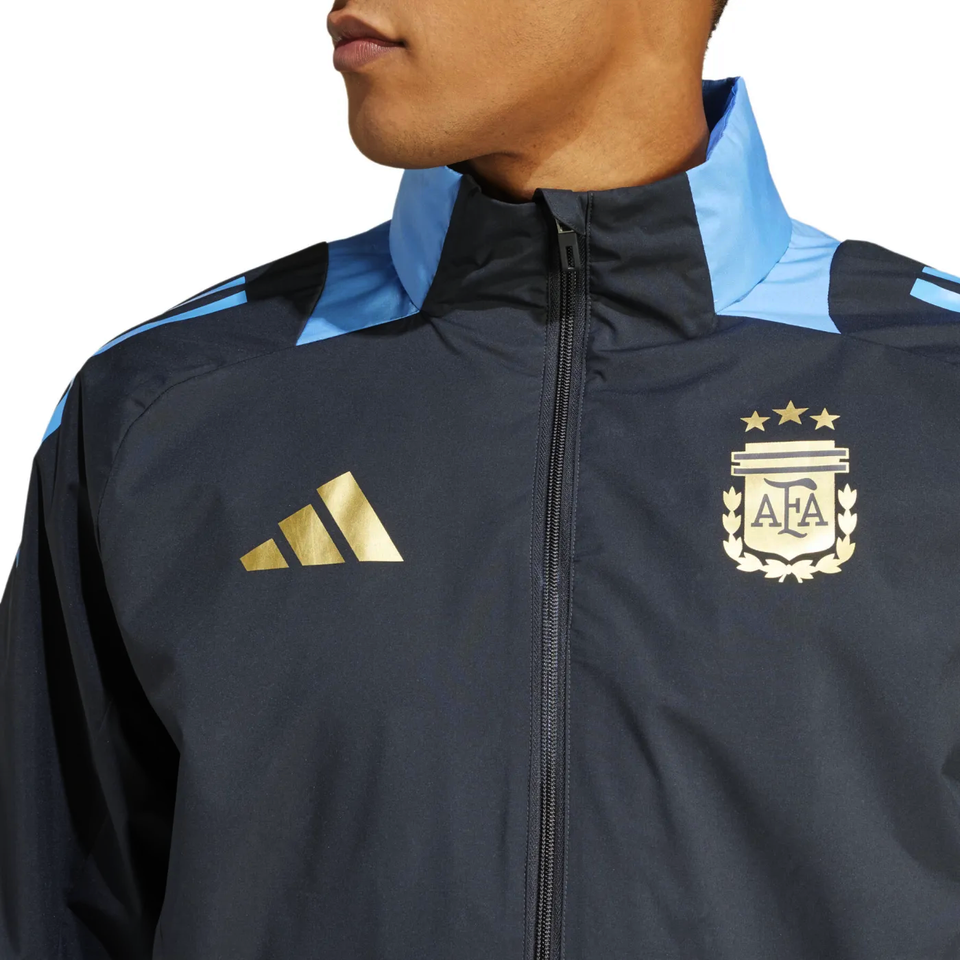 Argentina soccer rain jacket 2024 with black and blue design featuring gold Adidas logo and AFA crest