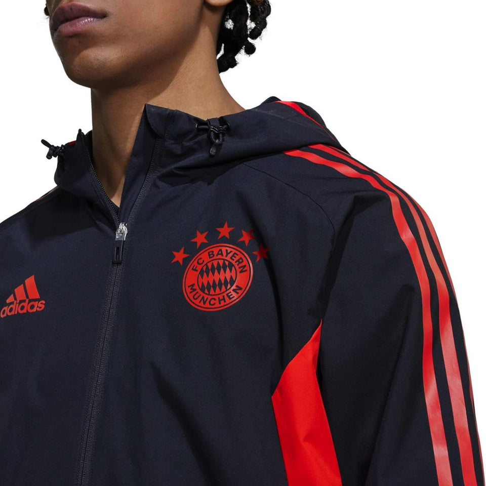 Adidas Bayern Munich 2022 black jacket with red accents and logo, designed for soccer fans