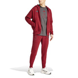 Men wearing Adidas Belgium hooded tracksuit in red with full-zip hoodie and matching jogger pants