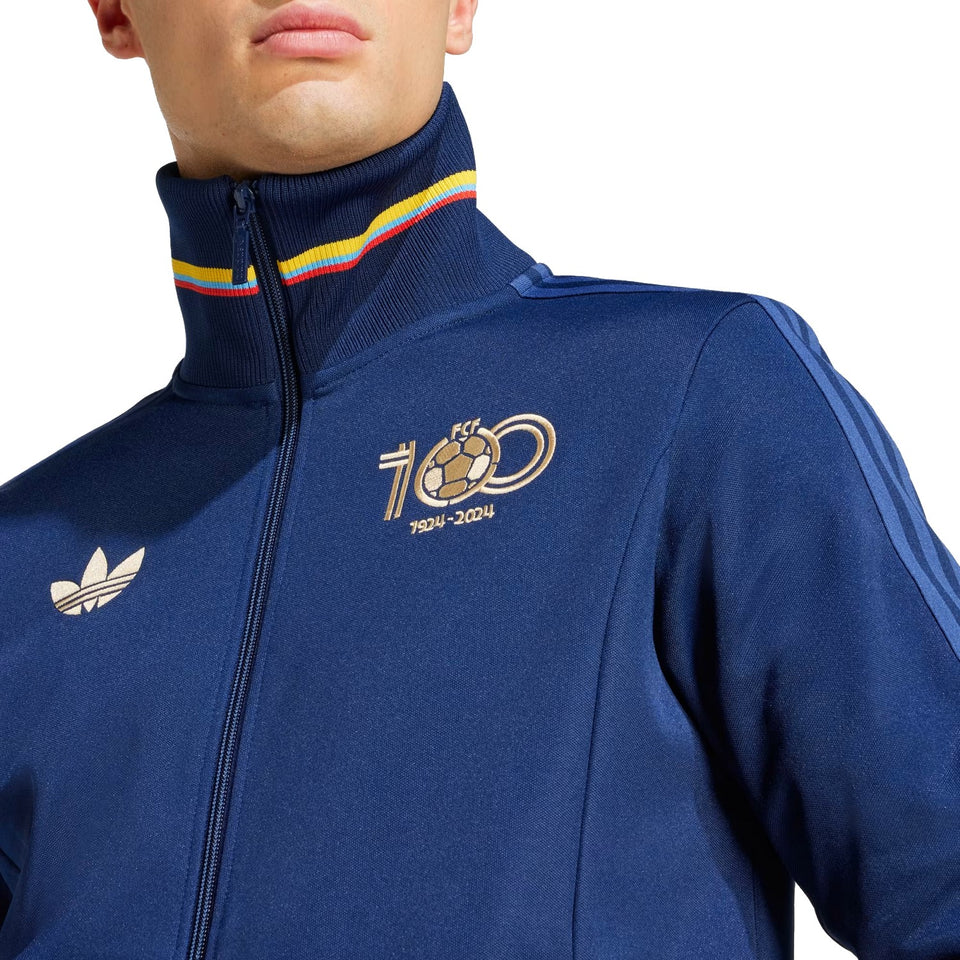 Adidas Colombia 100th anniversary tracksuit featuring a navy design with colorful detailing