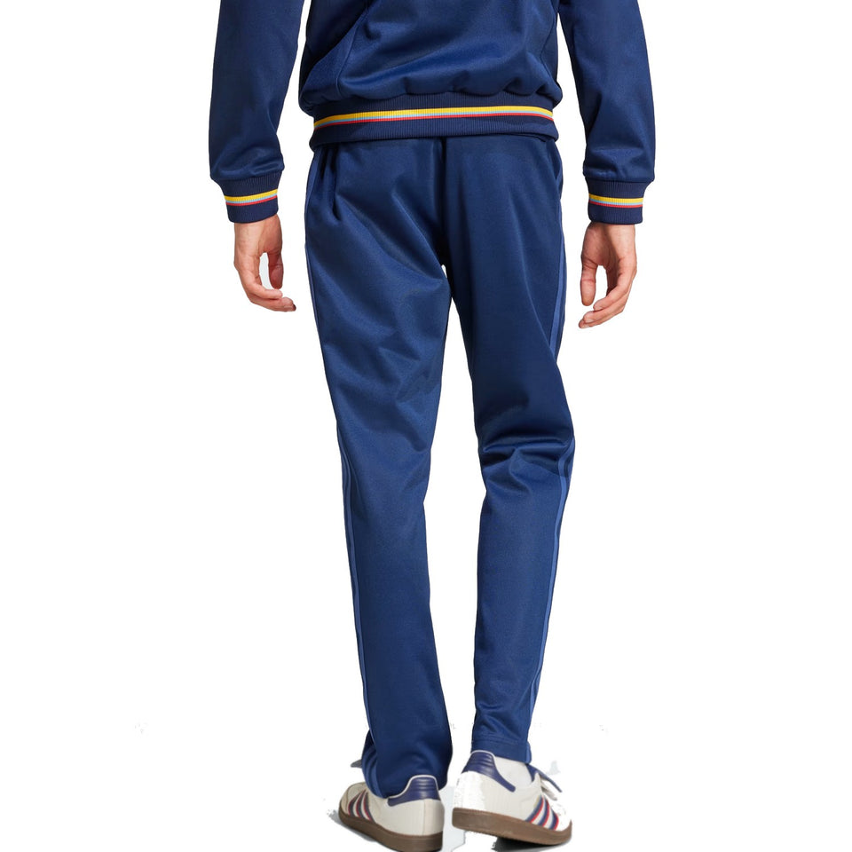 Back view of Adidas Colombia 100th anniversary tracksuit in navy with colorful accents for stylish comfort