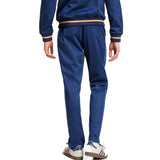 Back view of Adidas Colombia 100th anniversary tracksuit in navy with colorful accents for stylish comfort