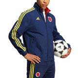 Adidas Colombia soccer jacket in navy with yellow stripes, perfect for soccer fans and players