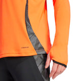 Close-up of Adidas Colombia training suit top in bright orange 