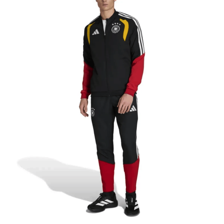 Germany black training presentation soccer tracksuit 2026/27 by Adidas with red and yellow accents