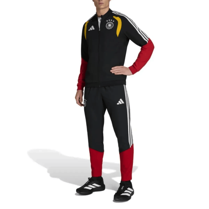 Germany black training presentation soccer tracksuit 2026/27 by Adidas with red and yellow accents