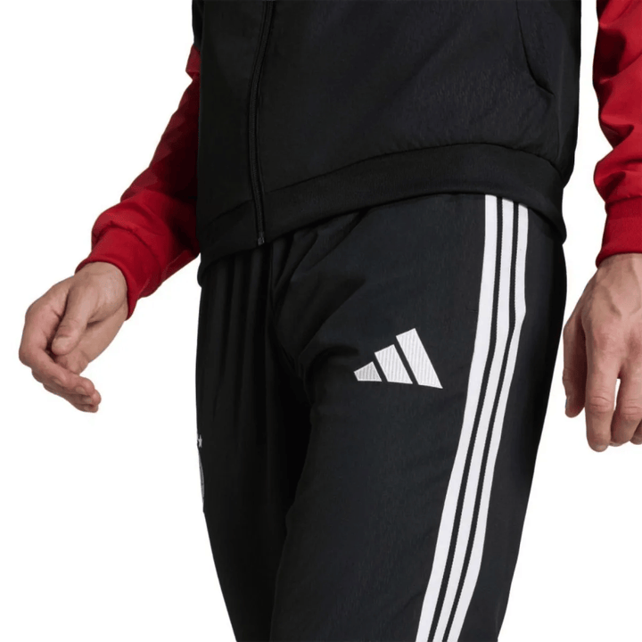 Germany black training presentation soccer tracksuit 2026/27 by Adidas with red accents and white stripes