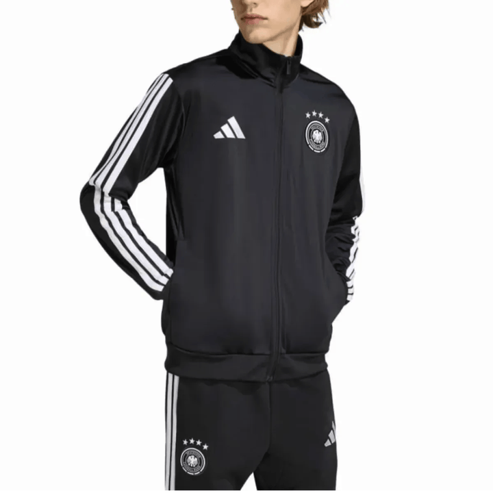 Black Adidas soccer tracksuit set featuring three white stripes and Germany emblem for casual wear.
