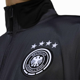 Adidas Germany black soccer tracksuit 2026 featuring the official DFB badge and four stars