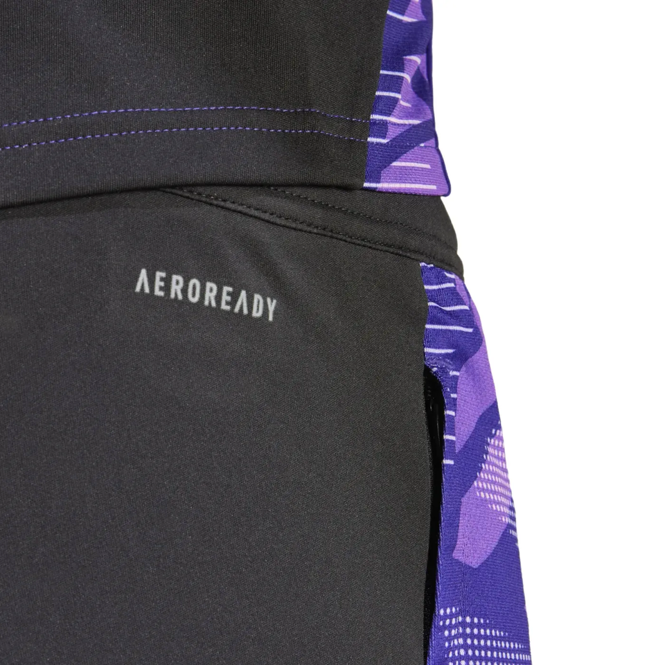 Close-up of Adidas Germany training suit 2024 black pants with purple side panels and Aeroready fabric