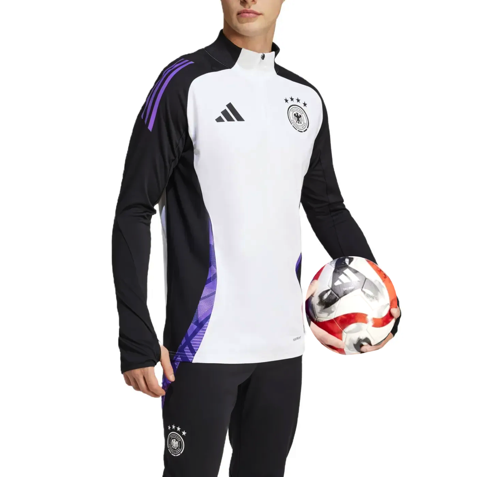 Adidas Germany training suit 2024 with black and white design and purple accents worn by male model holding a soccer ball