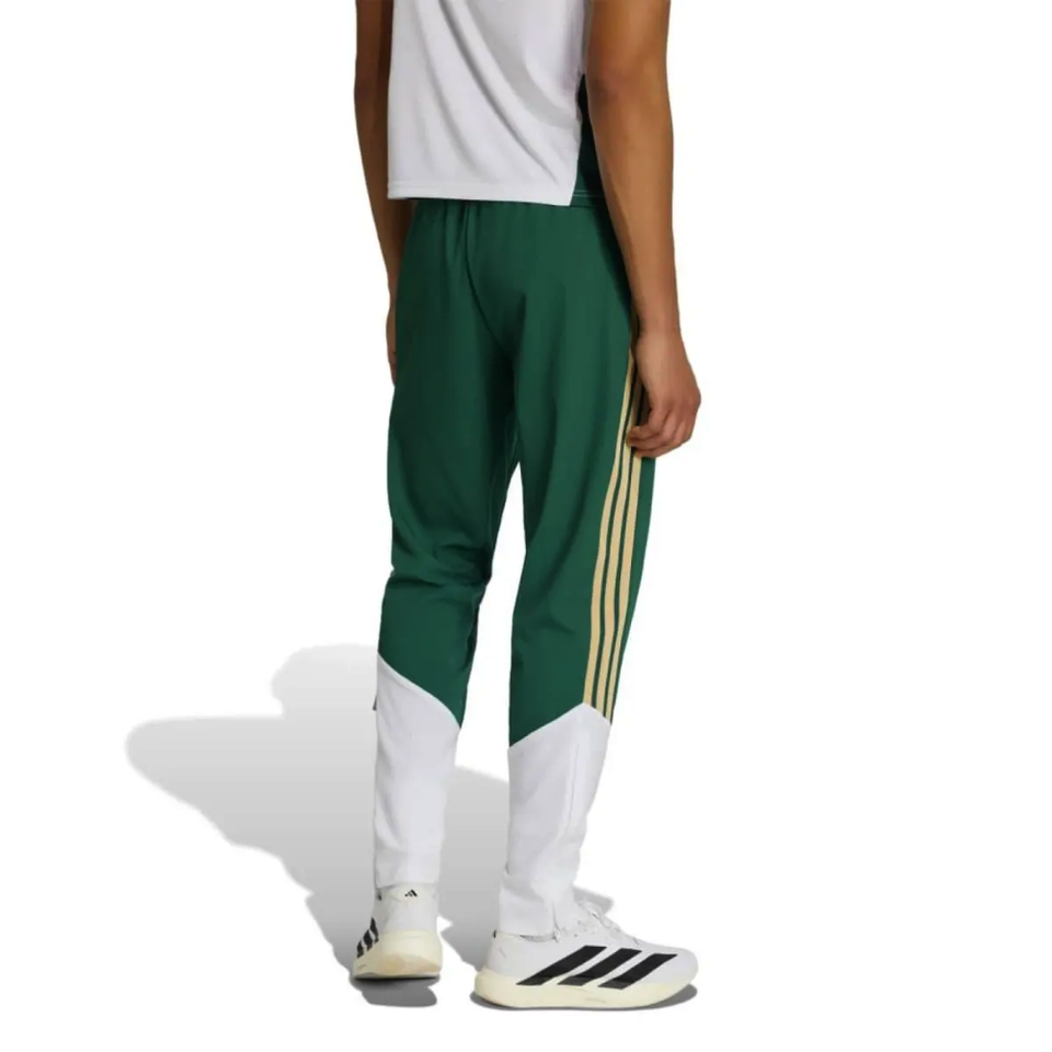 Adidas Italy green presentation tracksuit 2026 featuring stylish design and modern fit for athletes