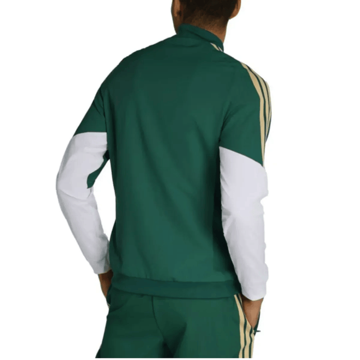 Italy green training presentation soccer tracksuit set by Adidas with contrasting white sleeves and gold accents