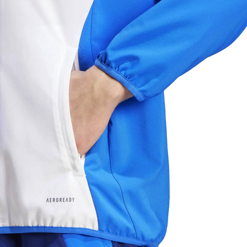 Italy national team presentation tracksuit blue jacket showing white side panel elastic cuff pocket with Aeroready branding
