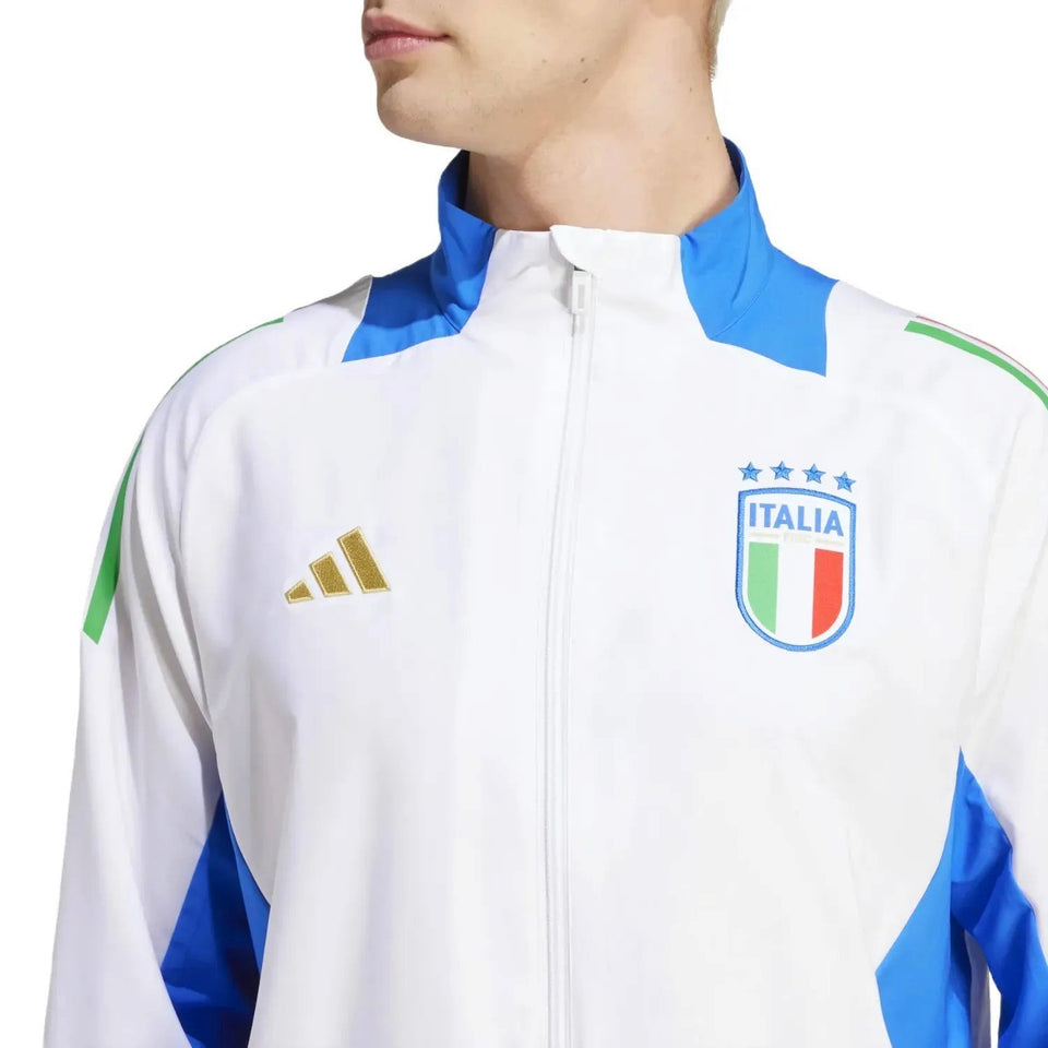 Male model wearing Italy national team presentation tracksuit white jacket with blue accents and Italia crest