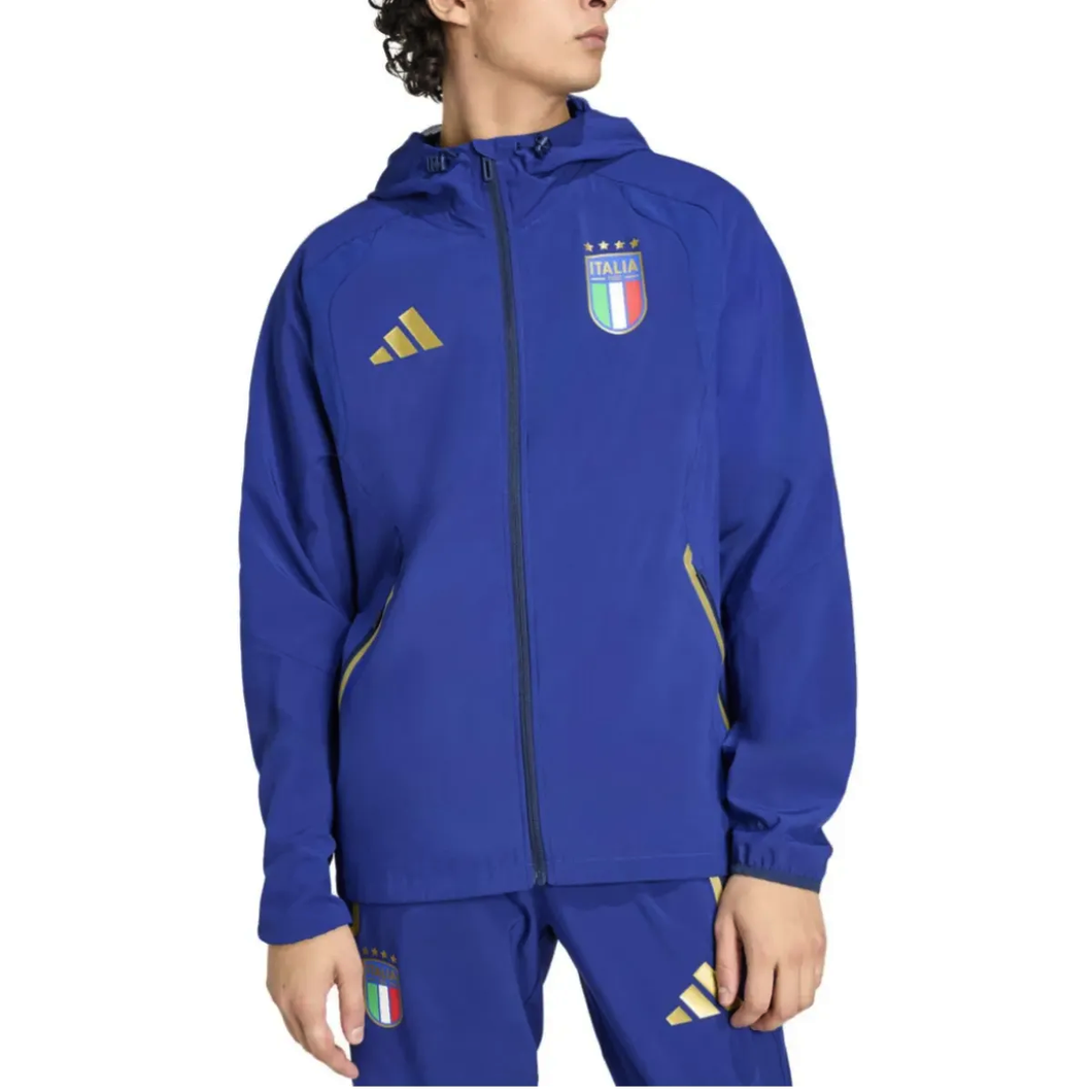 Adidas Italy woven tracksuit 2026 featuring a blue jacket and pants with Italy logo and adjustable hood