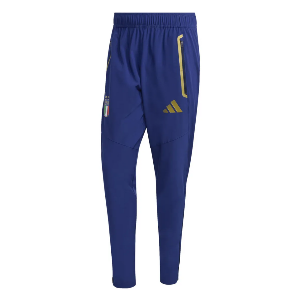 Adidas Italy woven tracksuit 2026 featuring stylish tapered pants in blue with yellow accents