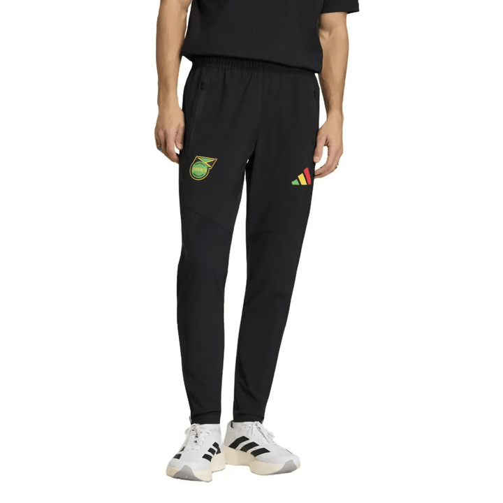 Black athletic pants with logo and stripes, made of polyester, featuring an elastic waistband.
