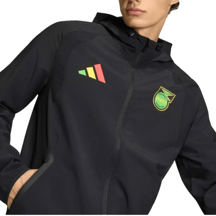 Black Adidas windbreaker jacket with logo and colorful design elements