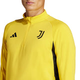 Juventus yellow training tracksuit 2024 top with black logo details on front on SoccerTracksuits.com