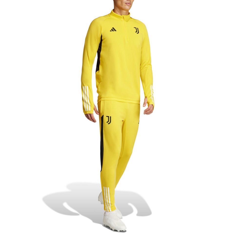 Juventus yellow training tracksuit 2024 worn by male model in full view on SoccerTracksuits.com
