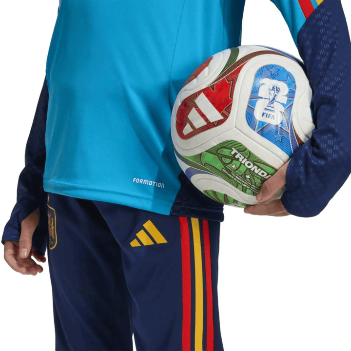 Kids Adidas Spain training technical soccer tracksuit 2026/27 in blue with red and yellow accents, includes matching pants.
