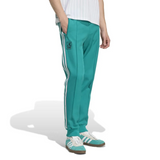 Stylish Liverpool Adidas Originals presentation tracksuit in teal with side stripes and logo