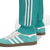 Liverpool Adidas Originals presentation tracksuit featuring vibrant colors and classic three-stripes