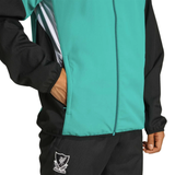 Liverpool Champions League tracksuit featuring a teal jacket and black pants with team logo