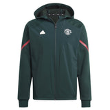 Adidas Man United pre-match suit in green with team logo and zip-up hoodie design