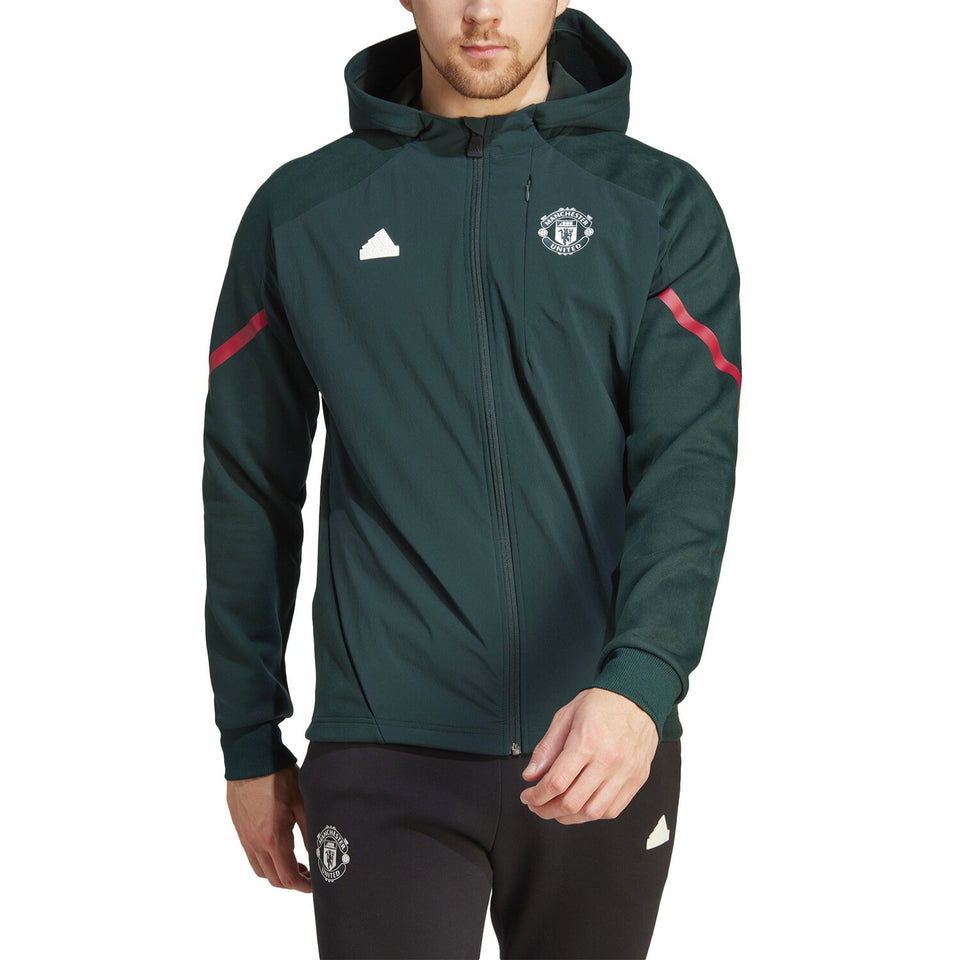 Adidas Man United pre-match suit with zip-up jacket and matching pants for soccer fans
