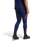 Adidas Manchester United 2024 training tracksuit navy blue pants with red stripes and emblem