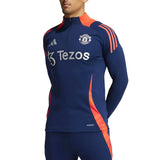 Manchester United 2024 training tracksuit in navy with red accents and sponsor logos